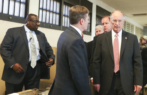 Alabama Gov. Robert Bentley listens to Prison Commissioner Jeff Dunn on a tour of a dormitory at William C. Holman Correctional facility in Atmore, Ala., Tuesday, March 15, 2016. At left is Holman Prison Warden Carter Davenport who was injured in one of the disturbances that have occurred in the last three days at the maximum security prison designed to house 637 inmates. The current population at Holman is 991, which is 156% of design capacity. (Alabama GovernorÕs Office, Jamie Martin)