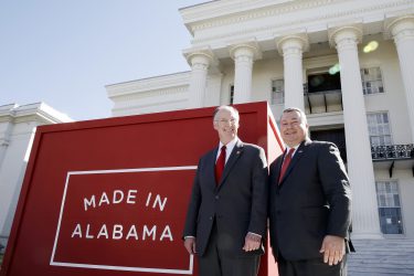 Gov. Robert Bentley and Secretary of Commerce Greg Canfield, right, enjoy the launch of  The Alabama Department of Commerce new branding campaign "Made in Alabama" on the steps of the state Capitol on Tuesday, March 19, 2013. The new brand is designed to build on the economic development momentum that has created more than 38,000 jobs in Alabama during the past two years. (Governor's Office, Jamie Martin)