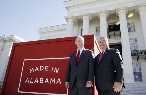 Gov. Robert Bentley and Secretary of Commerce Greg Canfield, right, enjoy the launch of  The Alabama Department of Commerce new branding campaign "Made in Alabama" on the steps of the state Capitol on Tuesday, March 19, 2013. The new brand is designed to build on the economic development momentum that has created more than 38,000 jobs in Alabama during the past two years. (Governor's Office, Jamie Martin)