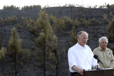 Alabama Gov. Robert Bentley appeals to citizens about the serious drought situation in the state after touring the site of a recent wildfire in Walker County, near Dora, Ala.,  Thursday, Oct. 27, 2016. He joined Interim State Forester Gary Cole and Assistant State Forester Dan Jackson in urging residents to obey the Drought Emergency Declaration, often called a "No Burn Order," that he signed earlier this month. Since October 1, 2016, 987 wildfires have destroyed more than 10,730 acres in Alabama, more than four times the amount that occurred during the same time period in 2015. (Governor's Office, Jamie Martin)